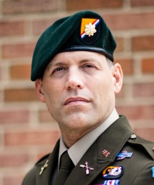nicholas dockery medal of honor recipient wearing a beret and military uniform